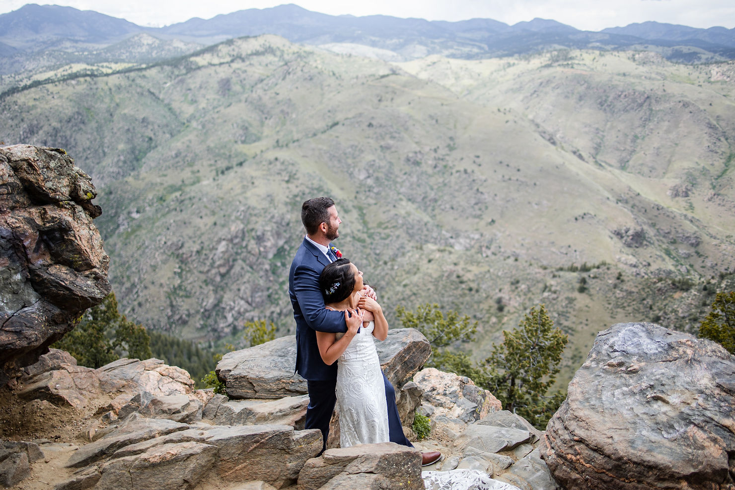 colorado elopement couple standing on cliff